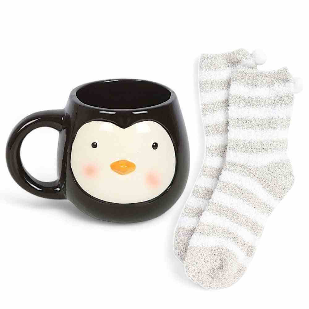 Penguin coffee mug with plush snow top and striped fuzzy socks