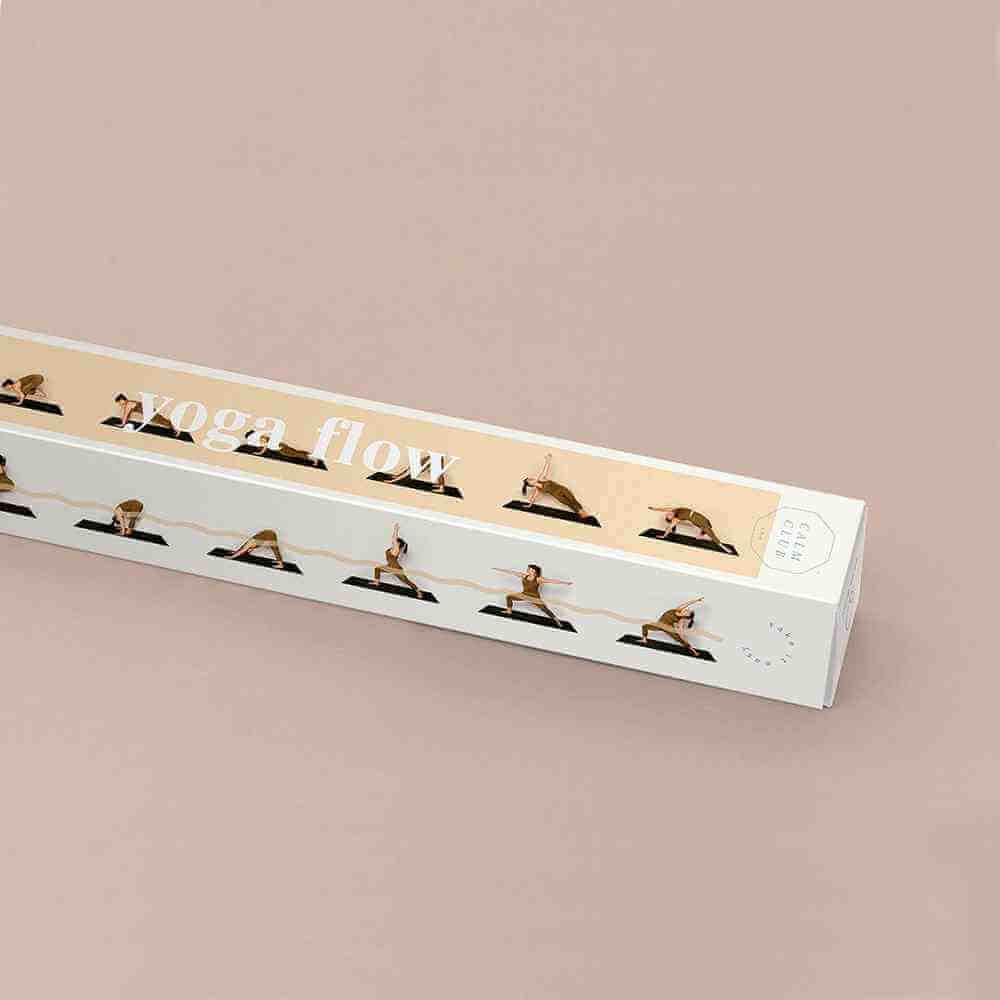 Yoga flow poster in frame showing header text 'Yoga flow' and small pose thumbnails