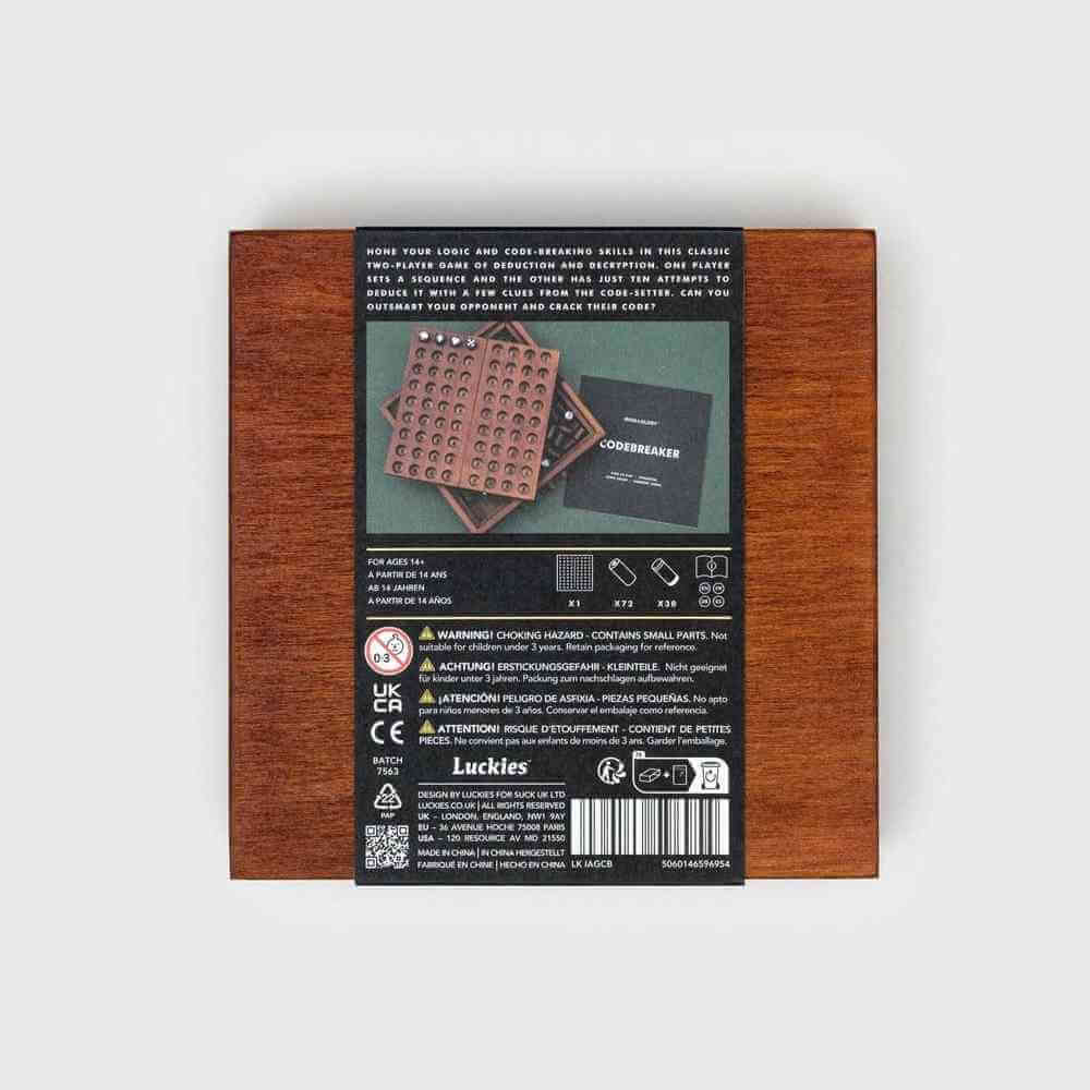 Wooden codebreaker game box back with instructions and caution icons