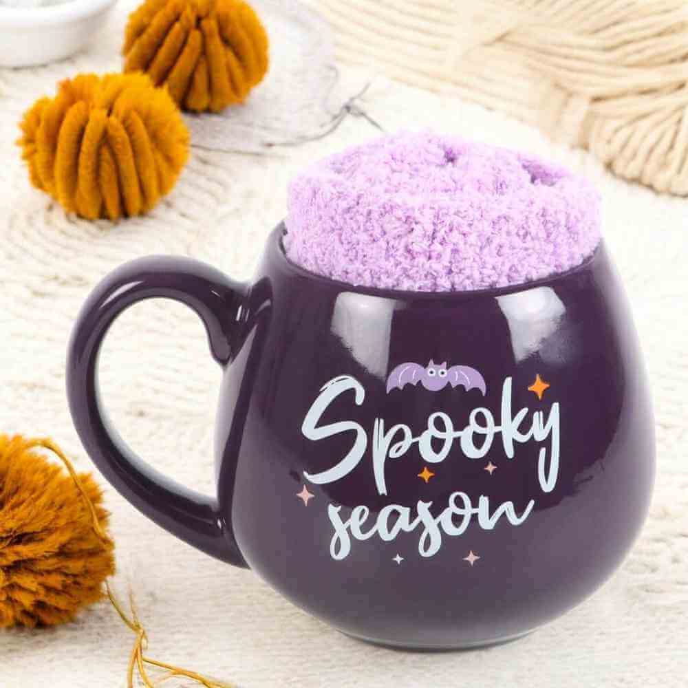 The Fashion Gift Shop: Spooky Season Mug and Lilac Socks Set for Cozy Nights by Spirit of equinox, Mugs and Cups