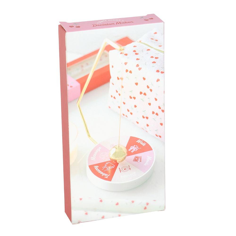 Packaged DecisionMaker pendulum game set with heart-patterned cloth cover