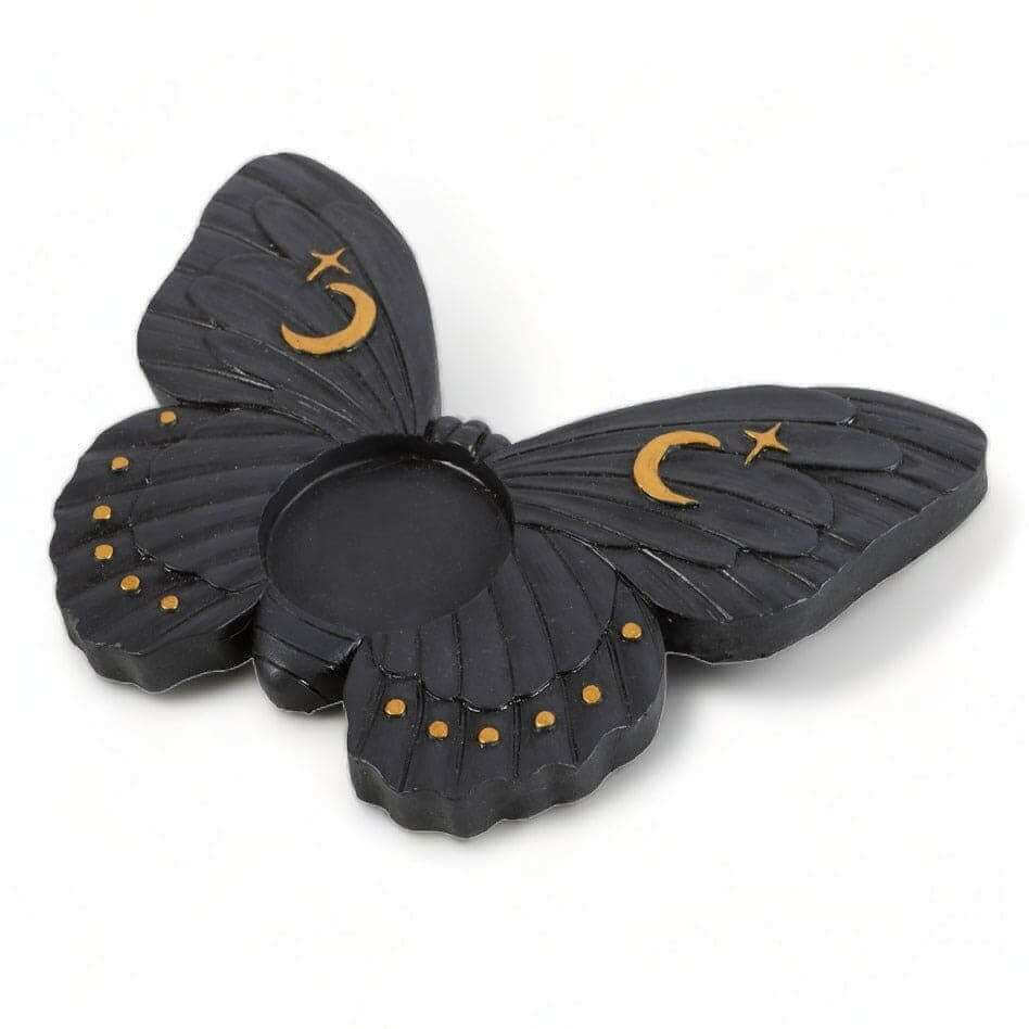 Moth tealight candle holder with layered dark wings, crescent moon and star accents, round candle opening