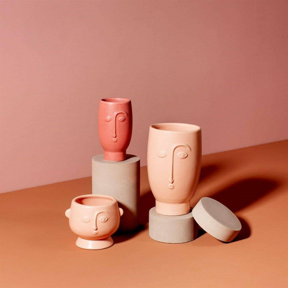 Set of matte face flower vases in blush pink with sculpted faces