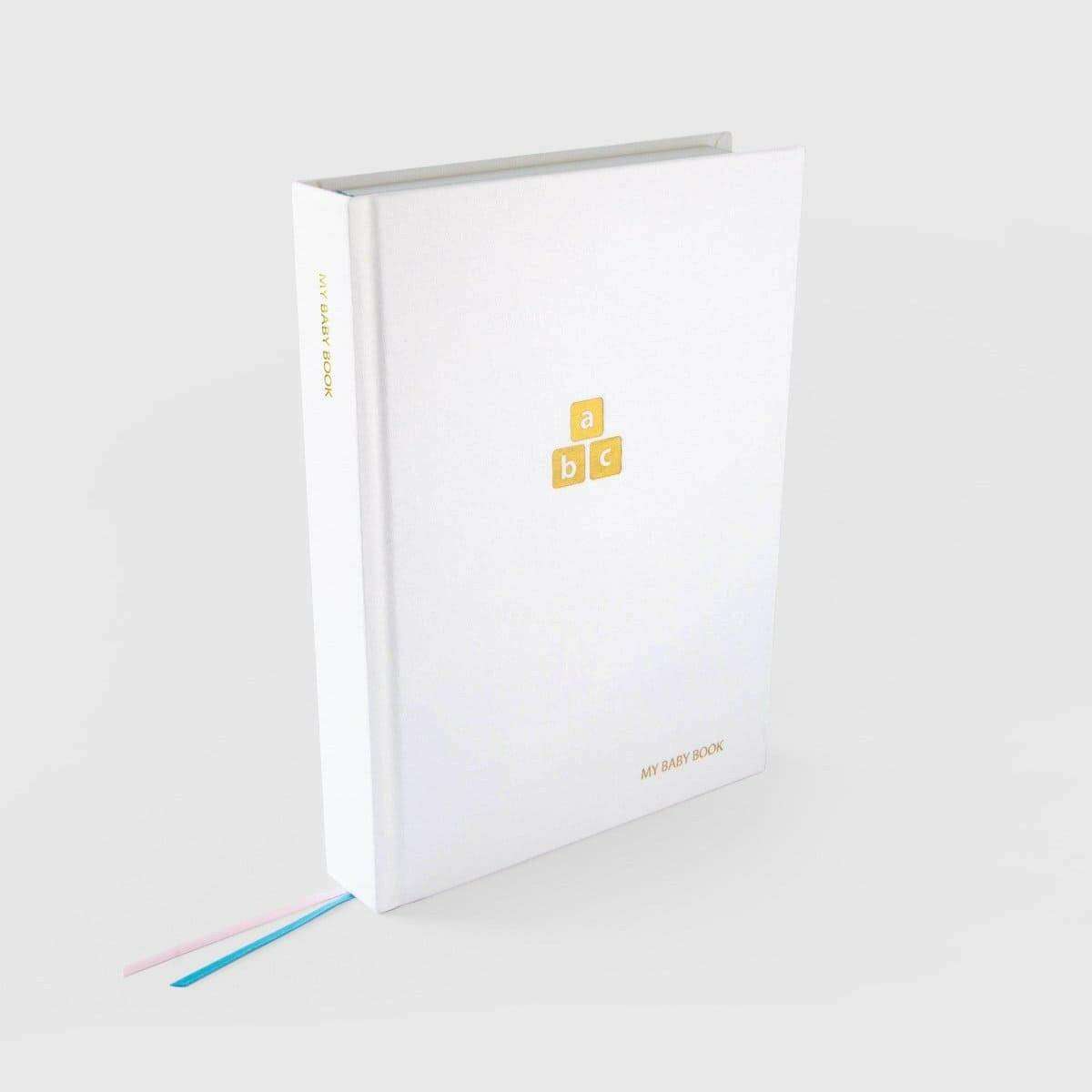White First Baby Years journal with spine visible and ABC logo on front cover