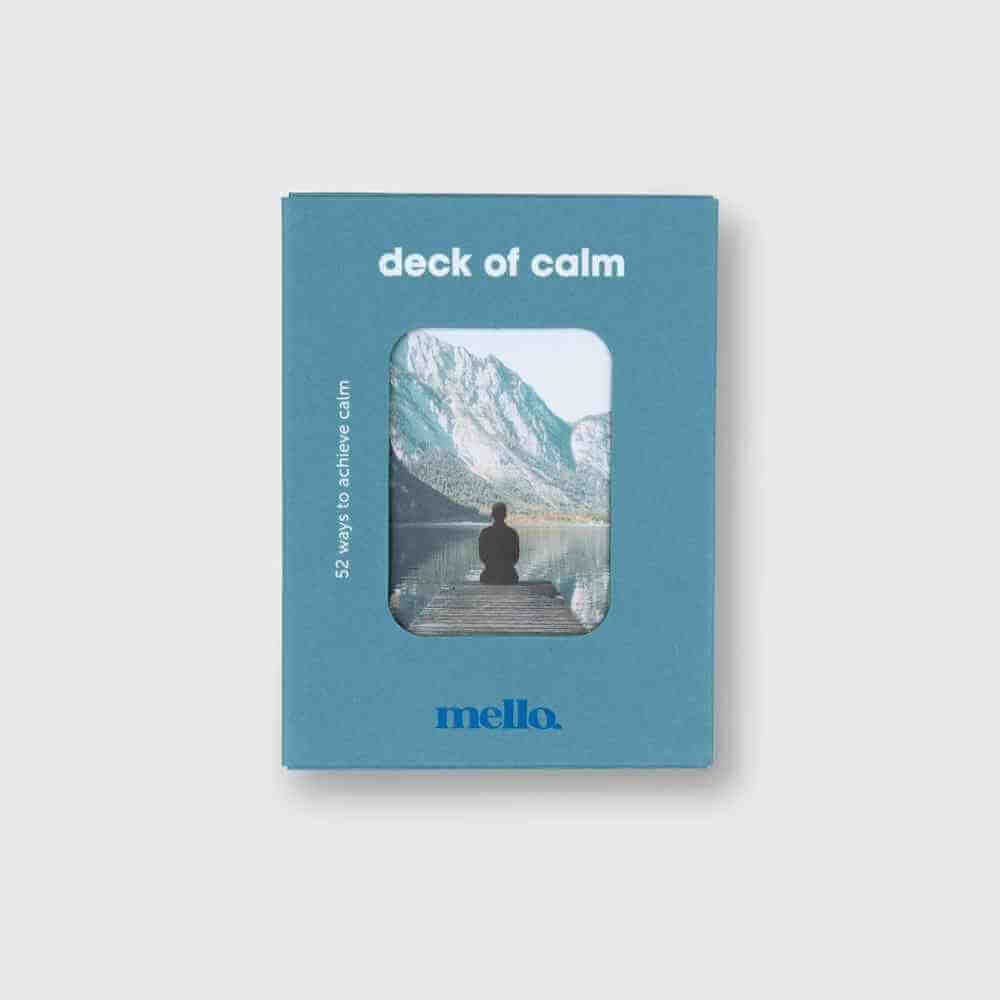 Self-help card deck in blue box, front view with person by lake card