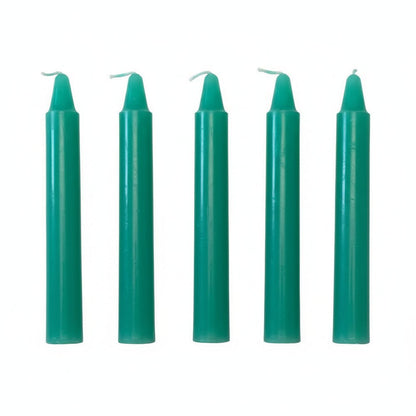 Six unlit teal pillar candles with flat tops