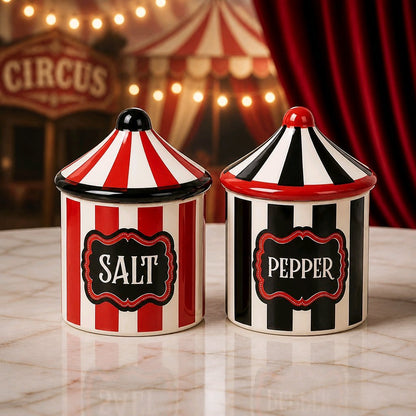 Circus tent salt and pepper shakers with SALT and PEPPER labels, striped design