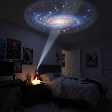 Rocket children’s night light and ceiling projector glowing in bedroom