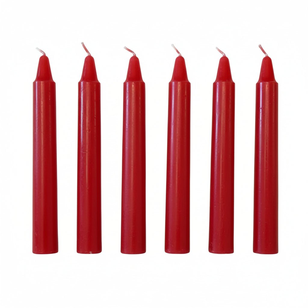 Six red taper candles with white wicks