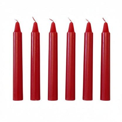 Six red taper candles with white wicks