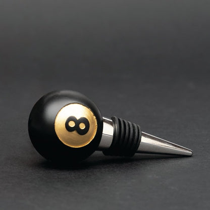 Black 8-ball bottle stopper with ribbed grip and stainless point spout