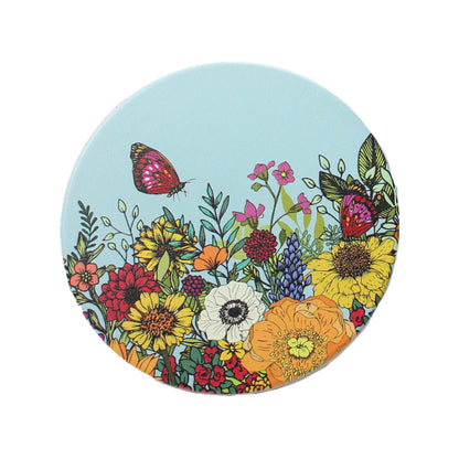 Round ceramic coaster with light blue background and colorful flowers with butterflies