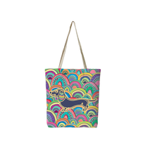 Reusable tote bag with colorful rainbow dachshund illustration and long fabric handles