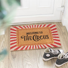 Striped coir doormat with red/cream rays and Welcome to the Circus text