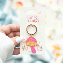 Mushroom keyring with pink and orange enamel charm on a bronze metal ring
