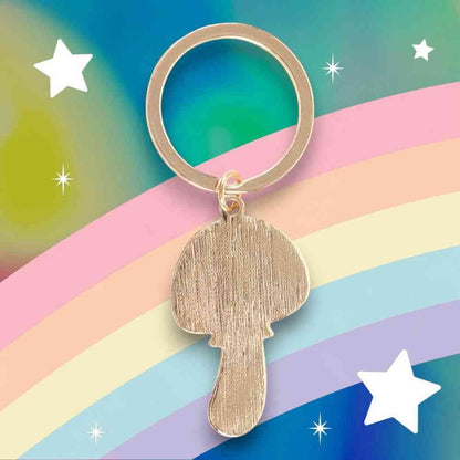 Mushroom keyring with metallic gold silhouette charm on a bronze metal ring