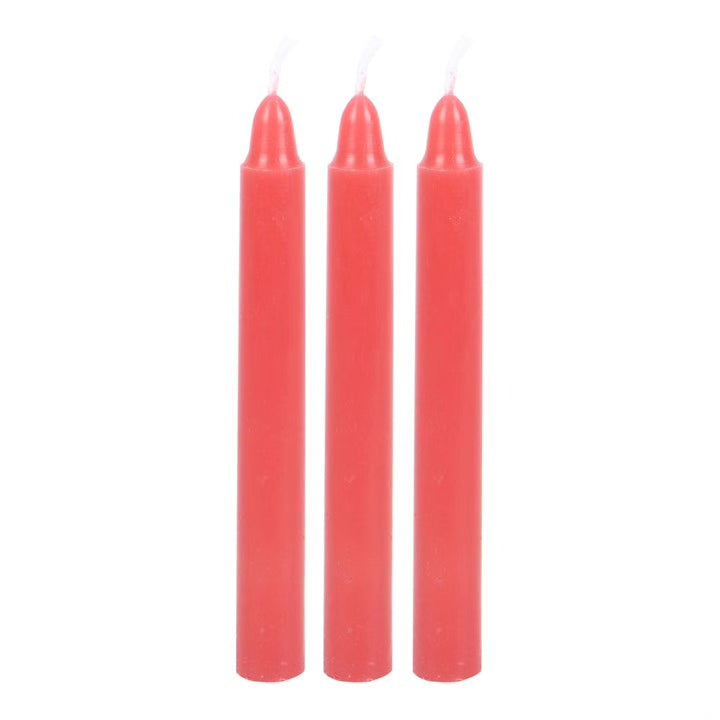 Three red taper candles, unscented, with white wicks