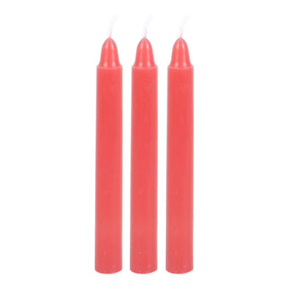 Three red taper candles, unscented, with white wicks