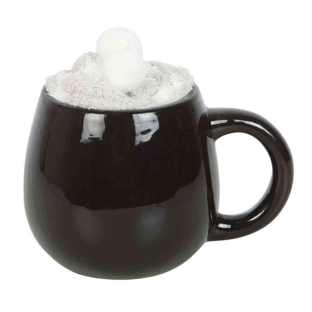 Penguin coffee mug in black with plush snow top and penguin face front