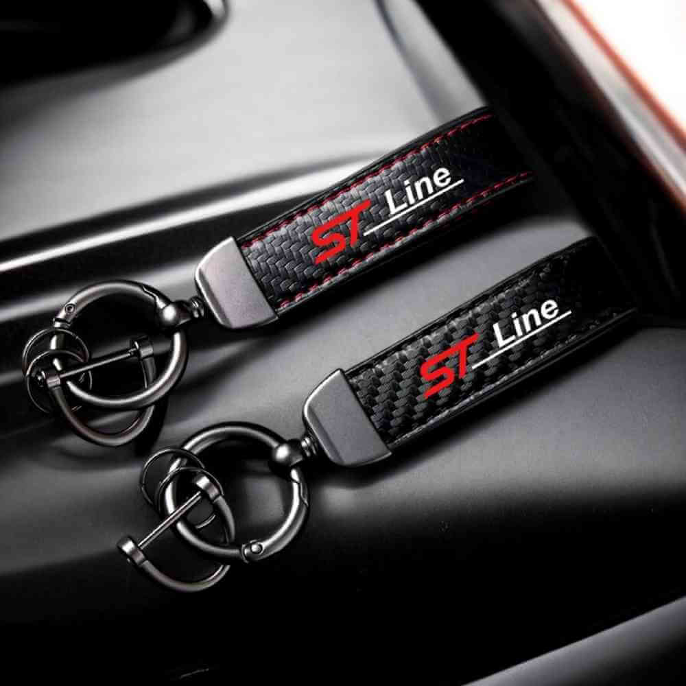 Black horseshoe-buckle keychain with carbon-fibre strap and red ST Line logo