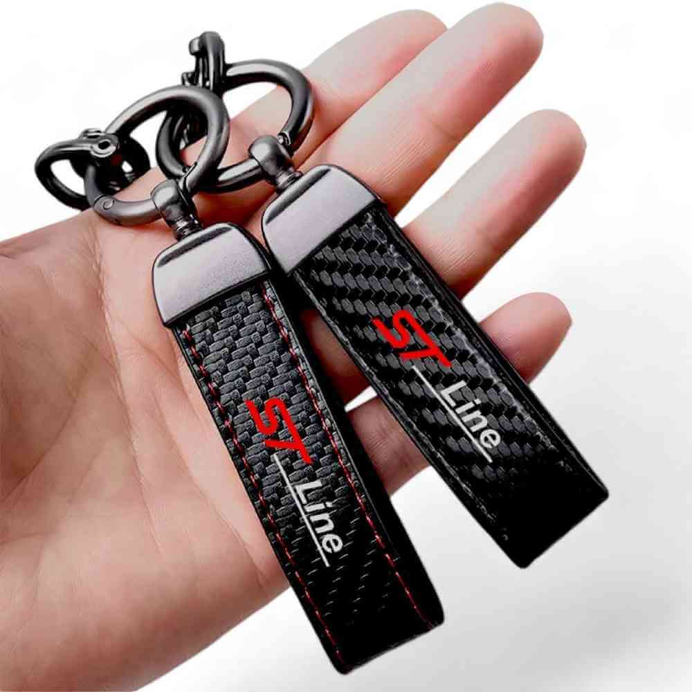 Black carbon-fibre style keychain with horseshoe buckle and ST Line logo strap