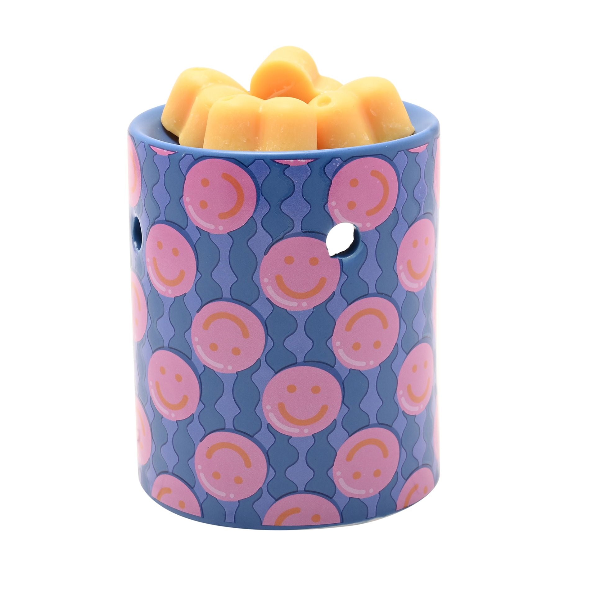 Purple patterned wax melt burner cylinder with yellow wax melts on top.