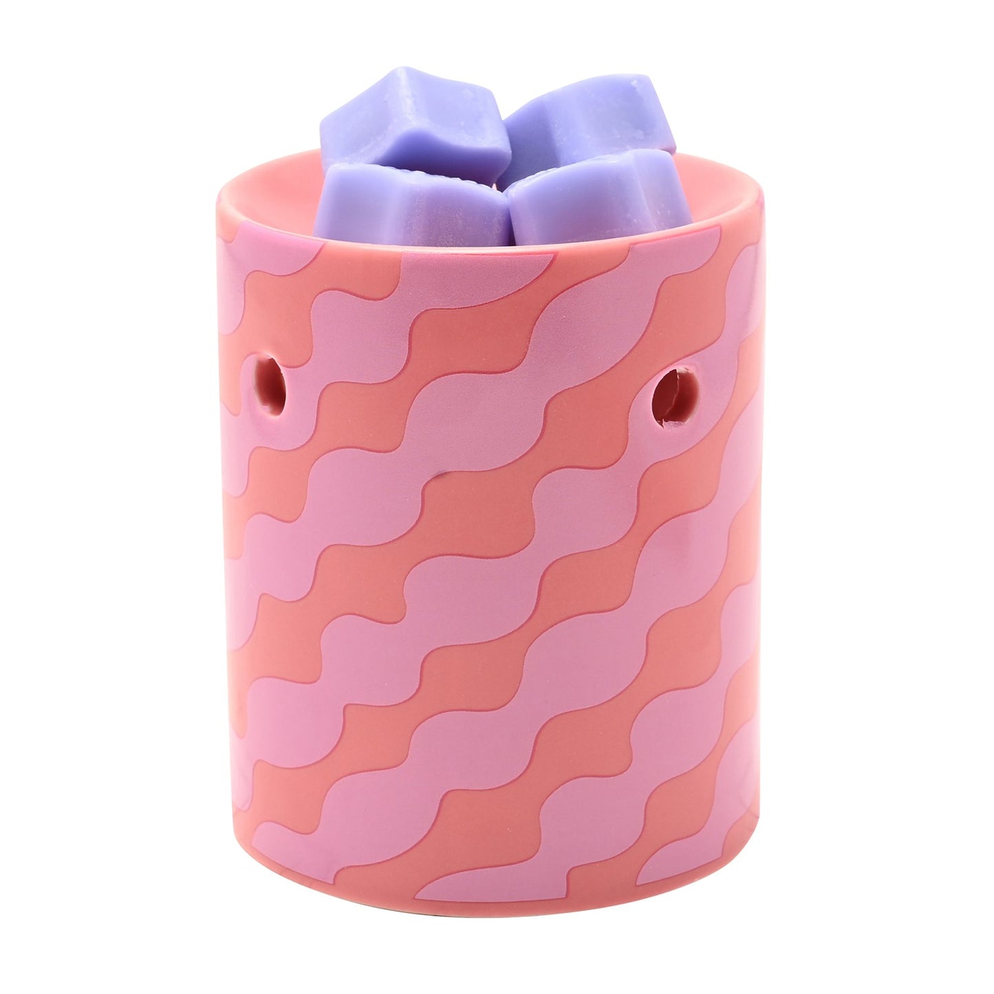 Pink wax melt burner with lilac star-shaped wax melts stacked on top