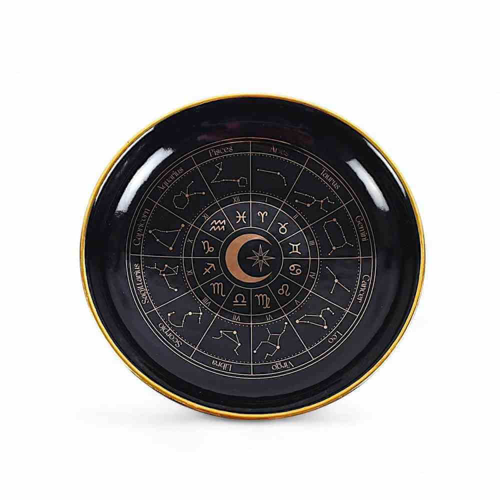 Black astrology wheel trinket dish with gold rim and zodiac constellation circle