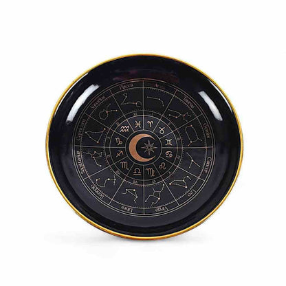 Black astrology wheel trinket dish with gold rim and zodiac constellation circle
