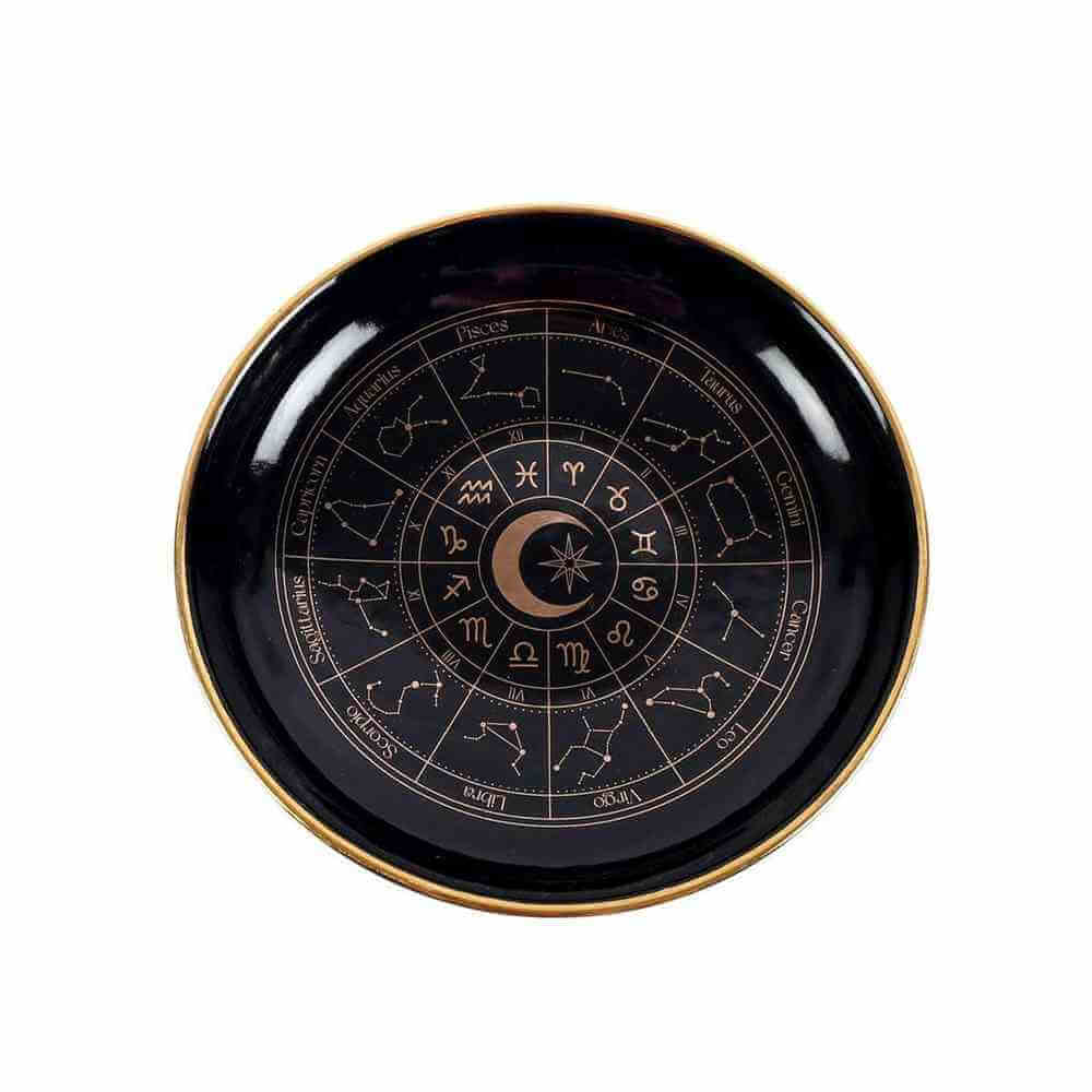 Glossy black trinket jewellery dish with gold border and central astrology star emblem