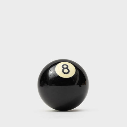 Black 8-ball style bottle opener with white 8 emblem on ball surface