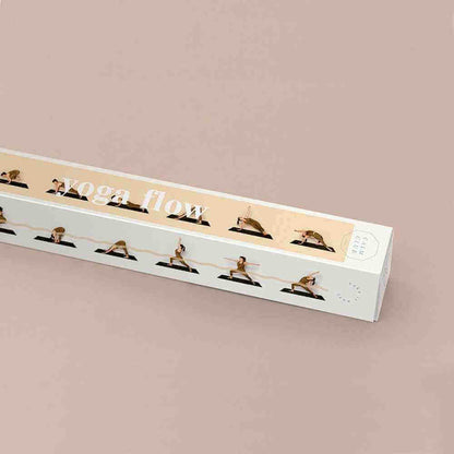 Yoga flow poster in frame showing header text 'Yoga flow' and small pose thumbnails