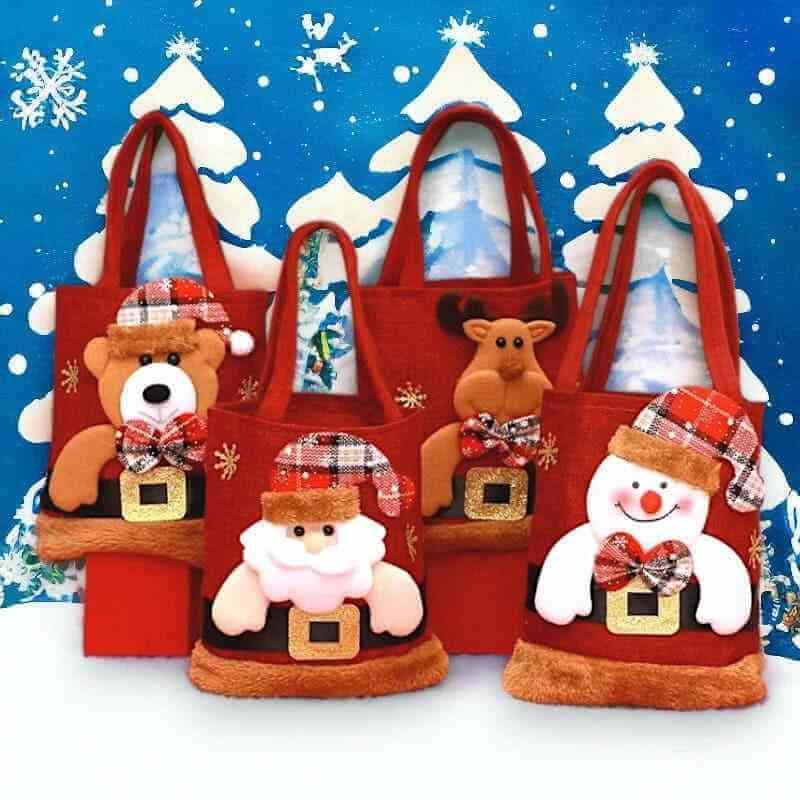 Red felt Christmas gift tote bags with bear, nutcracker, and snowman appliques