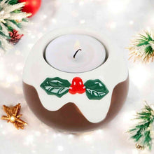 Pudding-shaped tealight candle holder with white top, brown base, holly and red bell detail