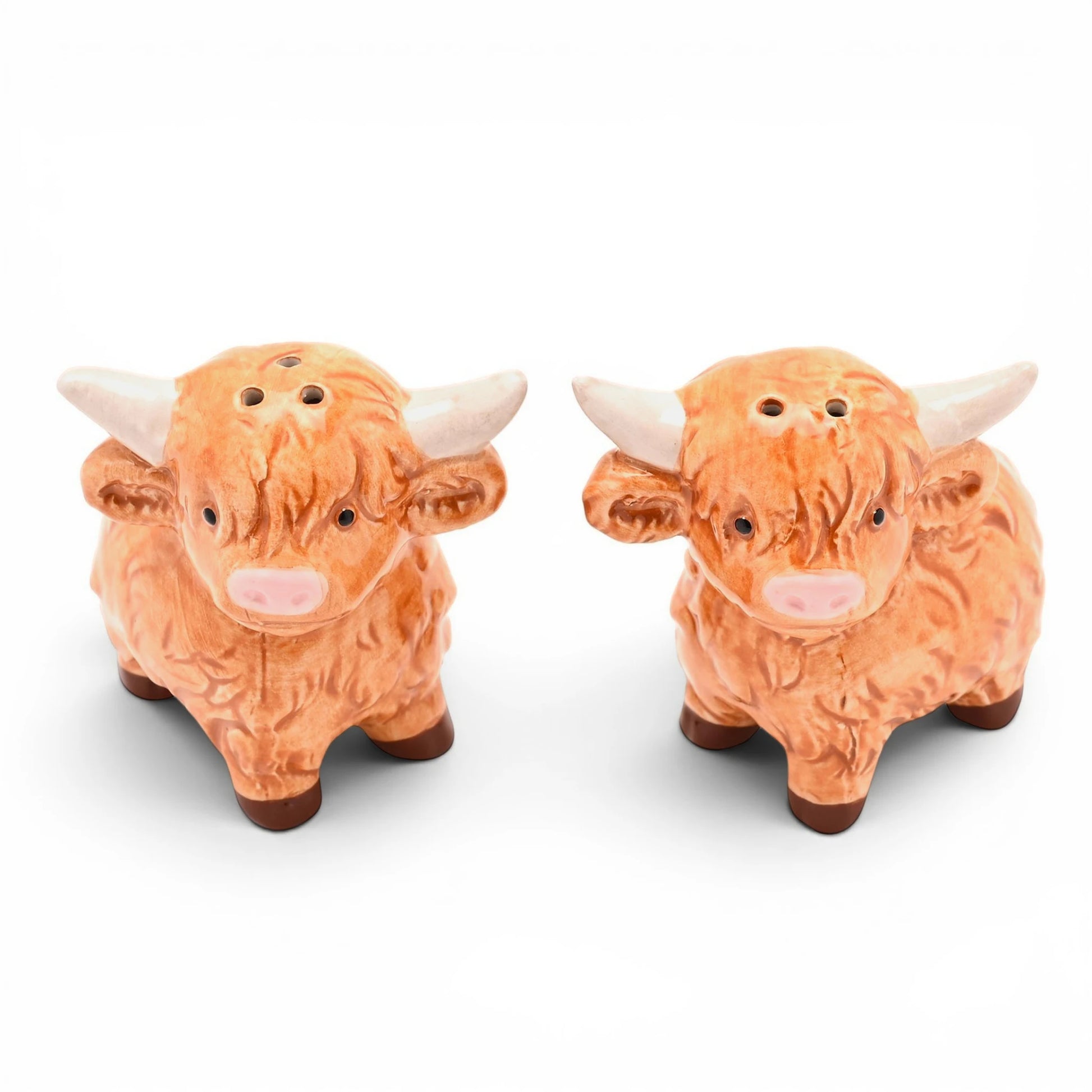 Highland cow salt and pepper shakers with close-up faces, orange-brown ceramic