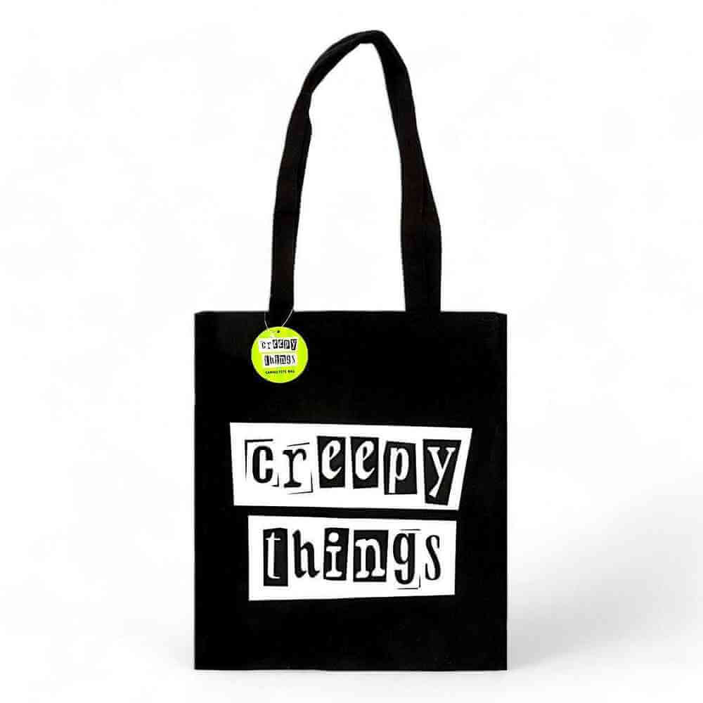 Black polycotton tote bag with 'Creepy Things' graphic on the front panel
