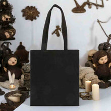 Black polycotton tote bag with vertical 'Creepy Things' logo on the front
