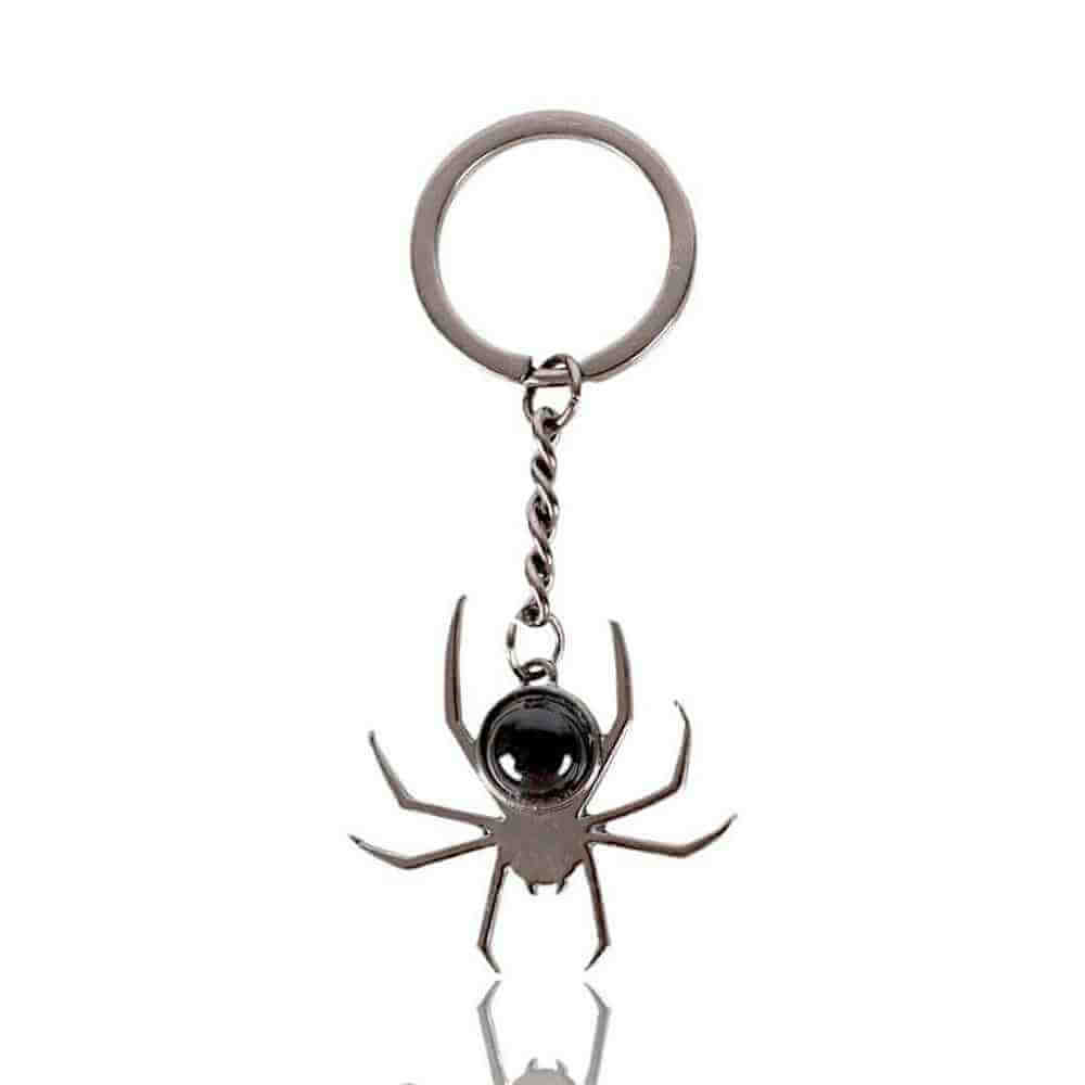 Black spider keyring with black round cabochon stone and silver chain