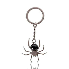 Black spider keyring with black round cabochon stone and silver chain