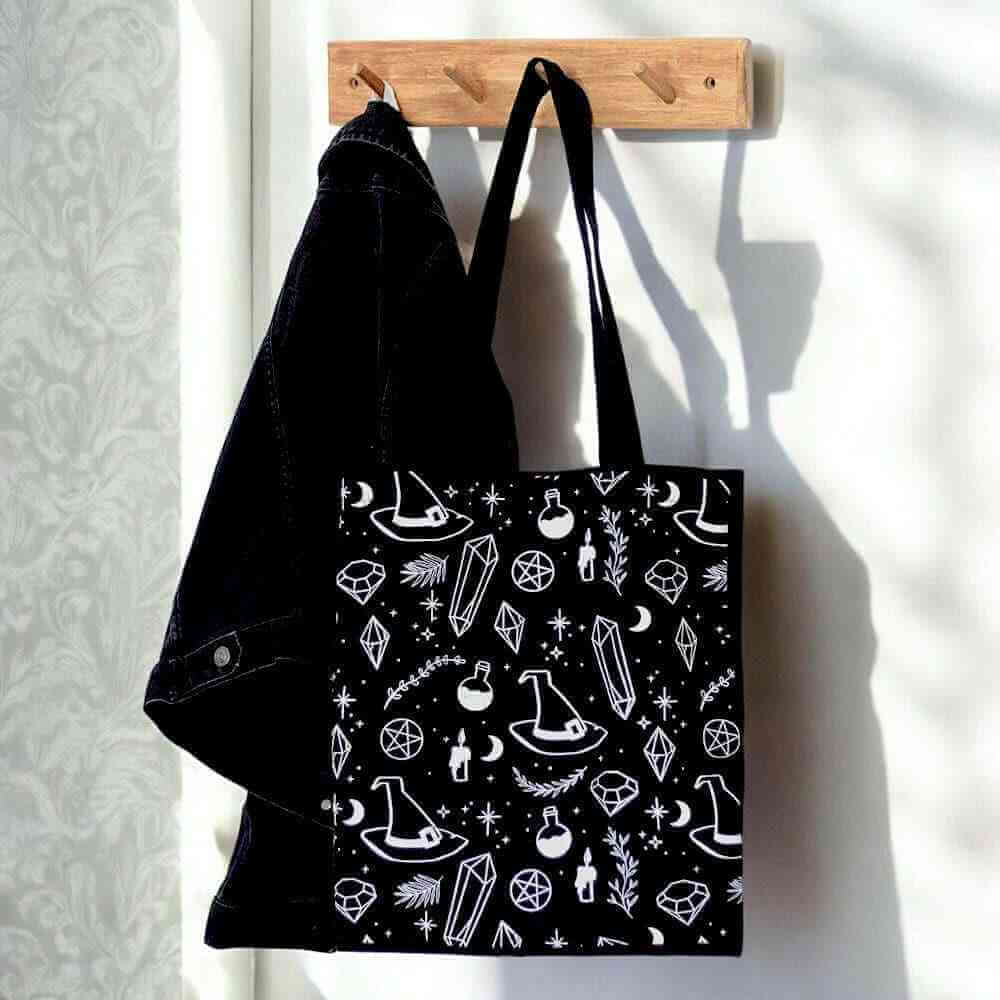 Black polycotton tote bag with white crystal-witch symbols and two top handles