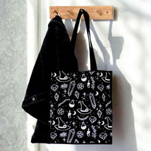 Black polycotton tote bag with white crystal-witch symbols and two top handles