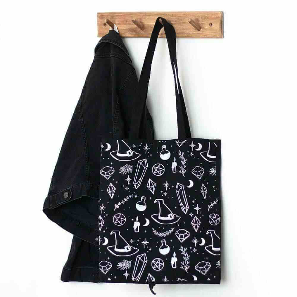 Black polycotton tote bag with white crystal-witch symbols print and hanging handles