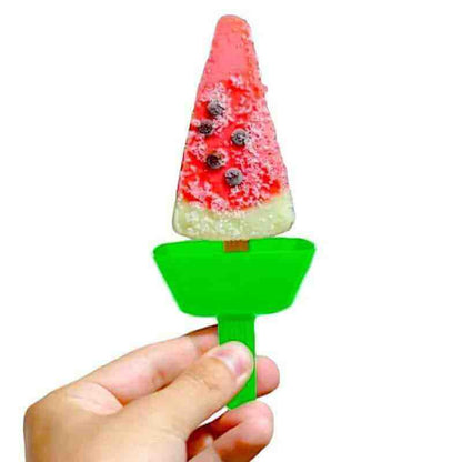 Green drip-proof ice lolly holder with a red berry ice pop on a stick