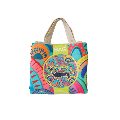 Reusable shopping bag with rainbow dachshund art, cream handles, front tag reading SHOPPING BAG