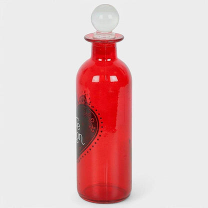 Red glass love potion bottle with clear crystal stopper