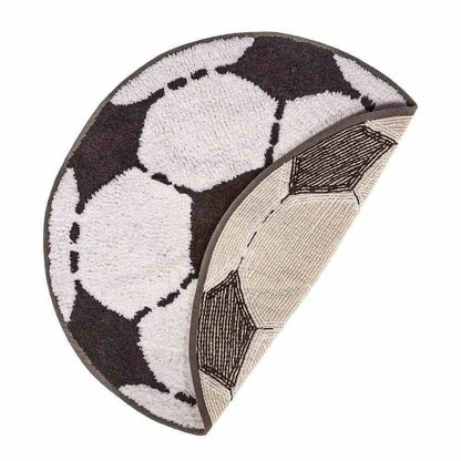 Football-shaped rug side view with black-and-white soccer ball pattern and rounded shape.