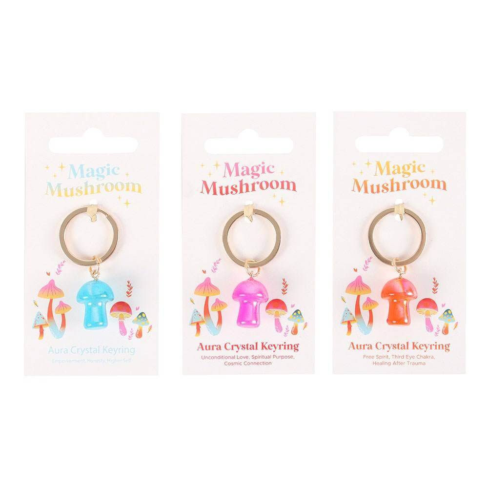 Three aura crystal mushroom keyrings on cards, blue, pink, orange