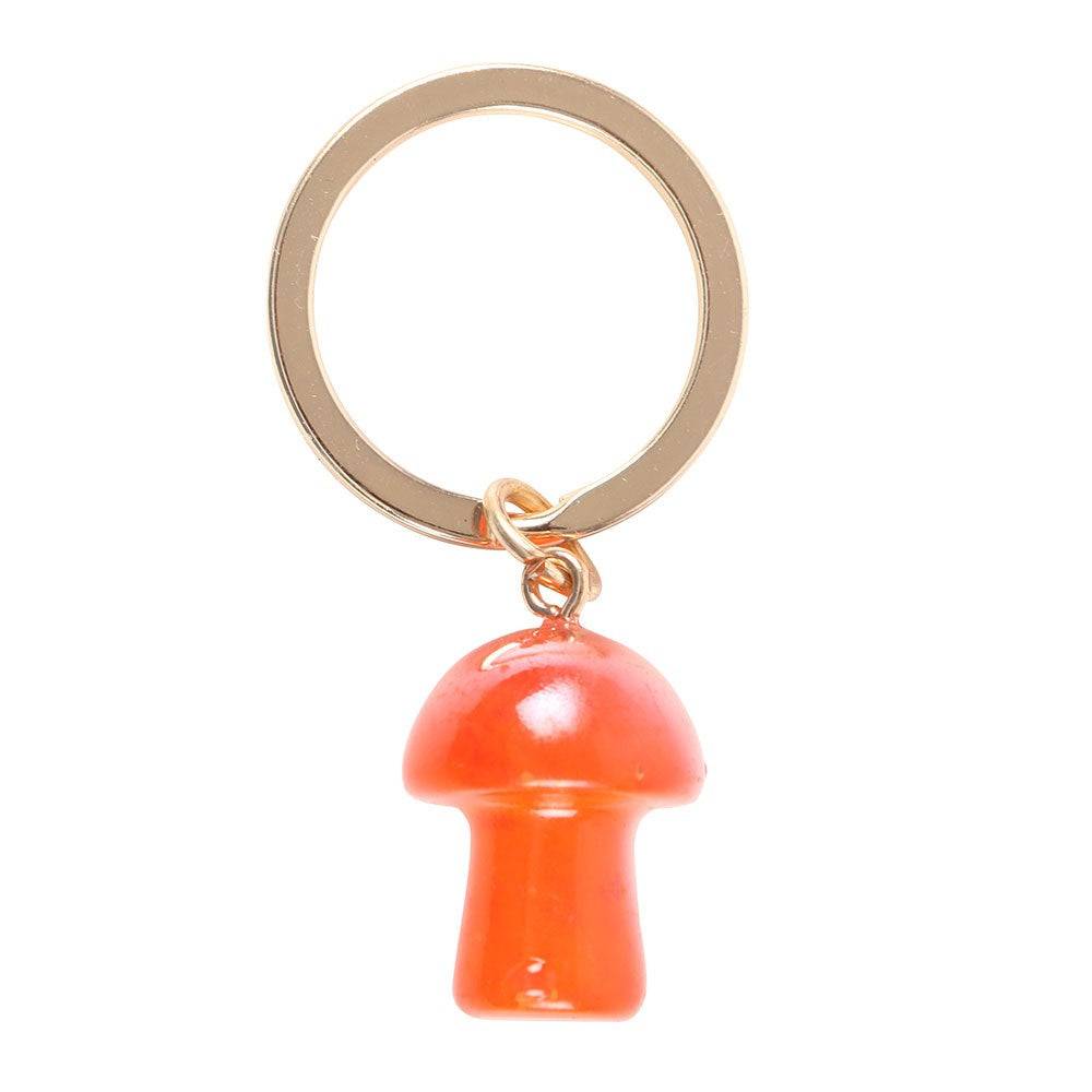 Orange mushroom crystal keyring with gold-tone ring and loop