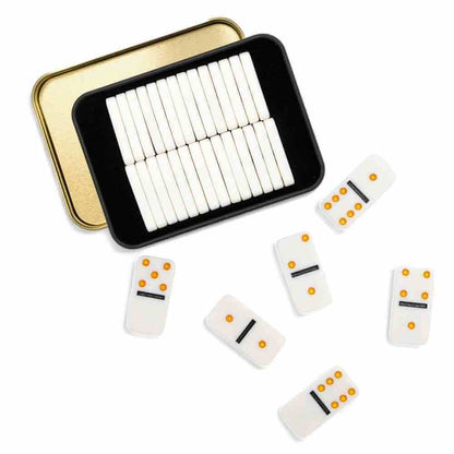 Pocket domino set with open black tray and white domino tiles; loose tiles shown nearby