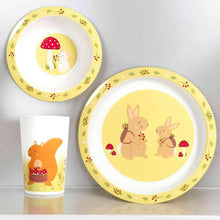 Kids tableware set: two patterned plates and a matching cup with rabbits and mushrooms